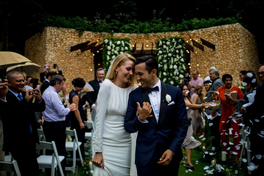 A bride and groom during their ceremony by Shangri-La wedding photographer Julian Abram Wainwright