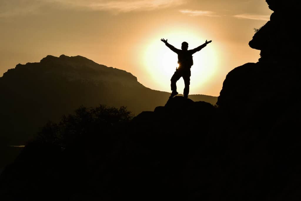 Geocacher celebrating being first to find a Cache