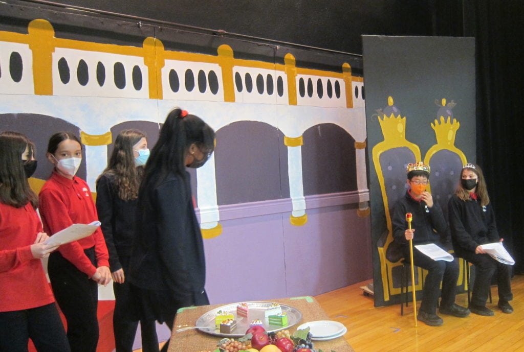 Students on stage during a play | Bishop Hamilton Montessori School in Ottawa