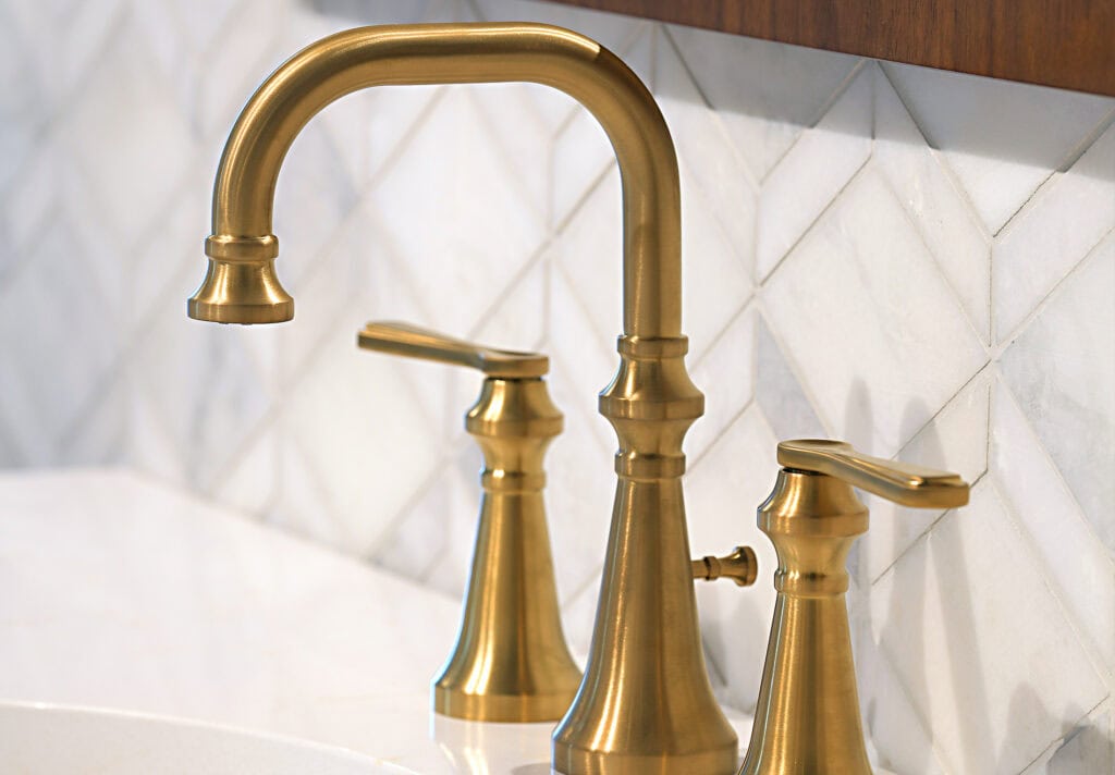 MID CENTURY MOEN COLINET FAUCET IN GOLD