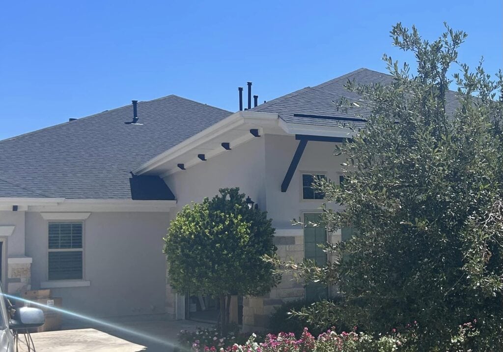Completed shingle roof installation on a residential home by JDCC Roofing in Weatherford, TX