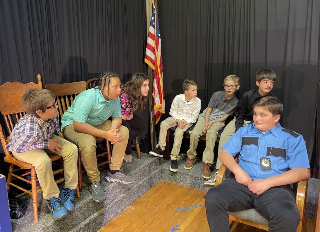 Order in the Court cast members at Martin Luther School