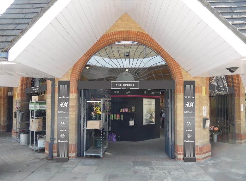 CGI of totem sings at the rear entrance of The Spires Shopping Centre
