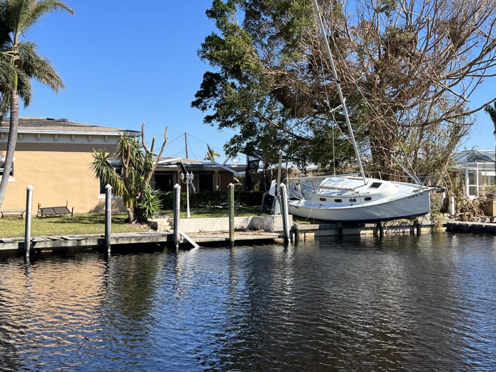 Hurricane damage in neighborhood on the water.