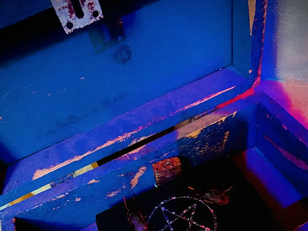 Eerie relics and ritual symbols inside The Basement haunted escape room