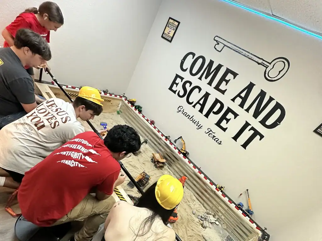 Children operating RC construction equipment in the Dig Zone