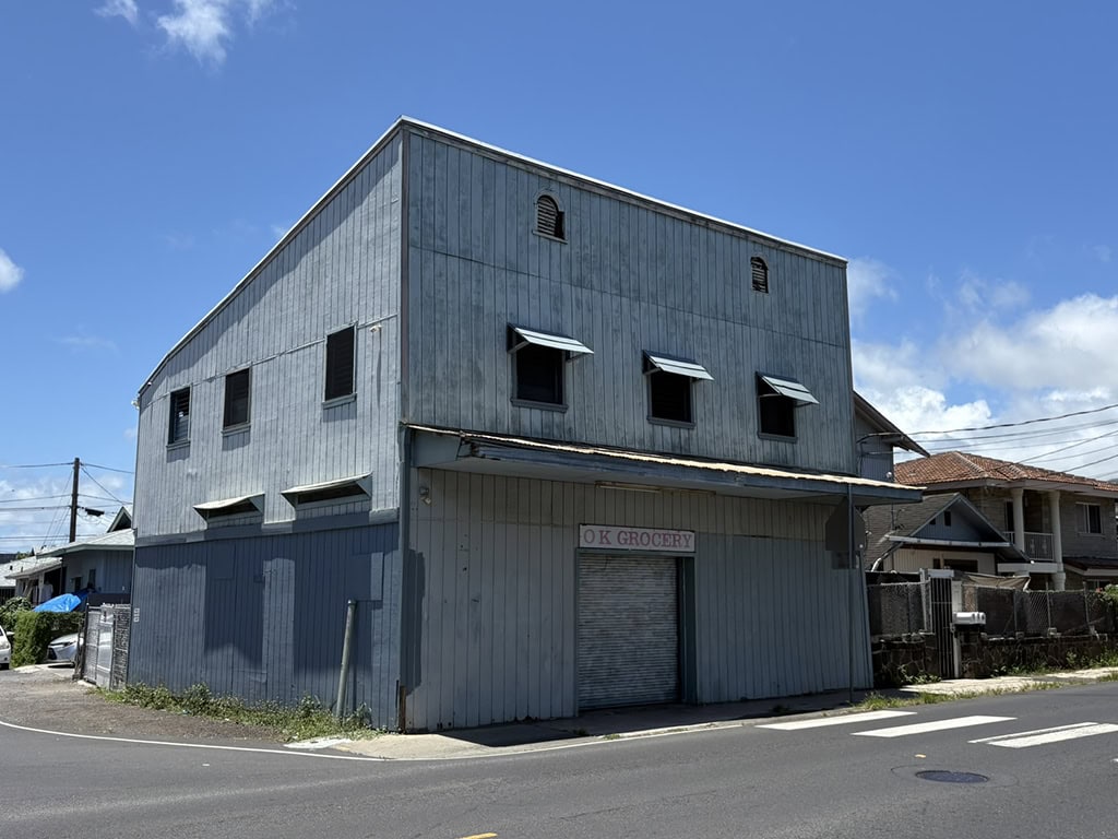 Old industrial building on a street corner in Honolulu, Hawaii.