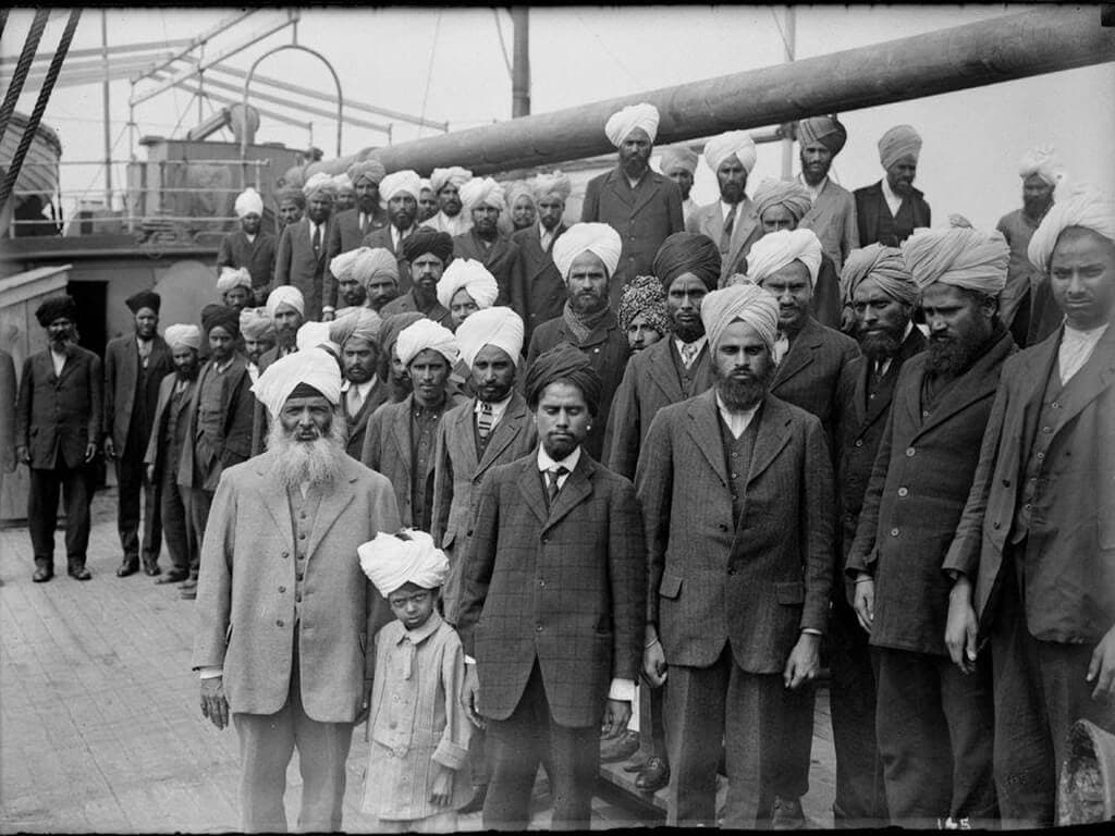 People standing on the deck of deck of the Komagata Maru