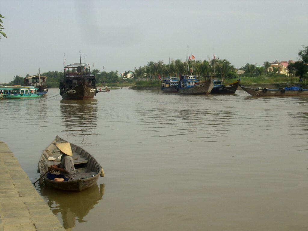 Hoi An - River and small vietnamese Boat