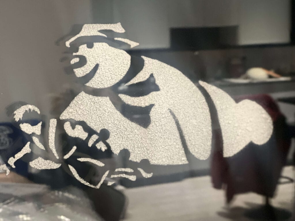 Snowman-reusable-window-stencil_sprayed-on-window