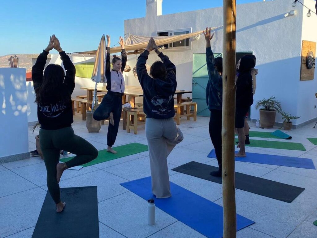 Yoga camp surf Morocco rooftop