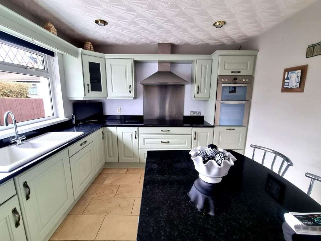 Modern kitchen interior with white cabinetry design