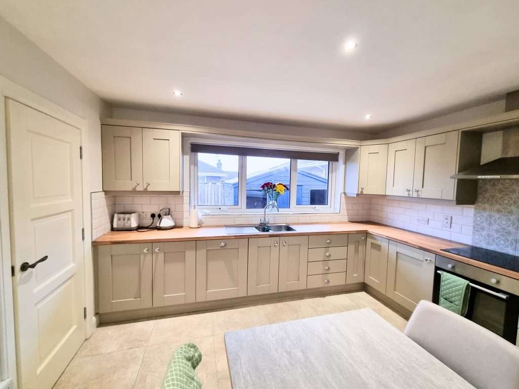 Modern kitchen interior with wooden countertops
