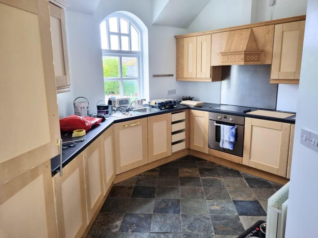 Modern kitchen with wood cabinets and appliances