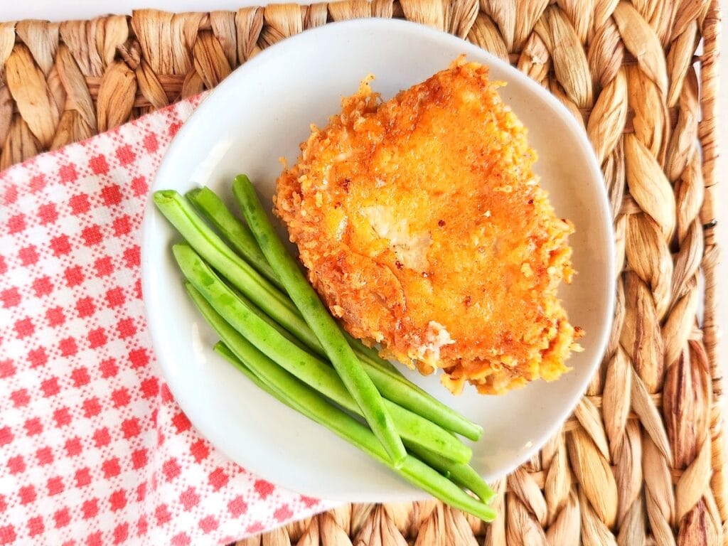 This recipe for Parmesan Crusted Pork Chops is so easy and delicious. The parmesan cheese gives it so much flavor and a crispy crust.