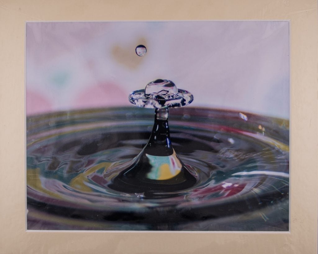 Mounted print product capturing high-speed water droplet splash in crown formation — part of EJC Photography’s fine art collection blending science and visual poetry.