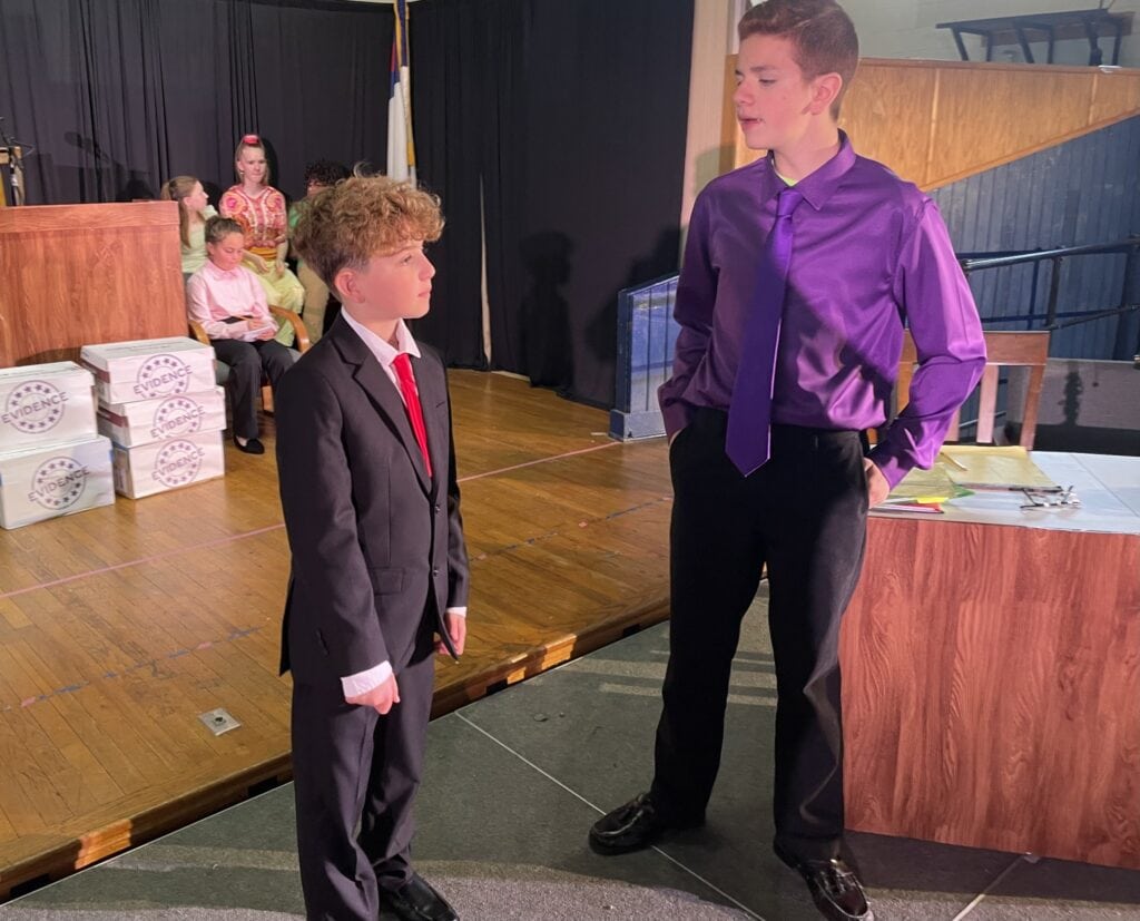 Order in the Court cast members at Martin Luther School