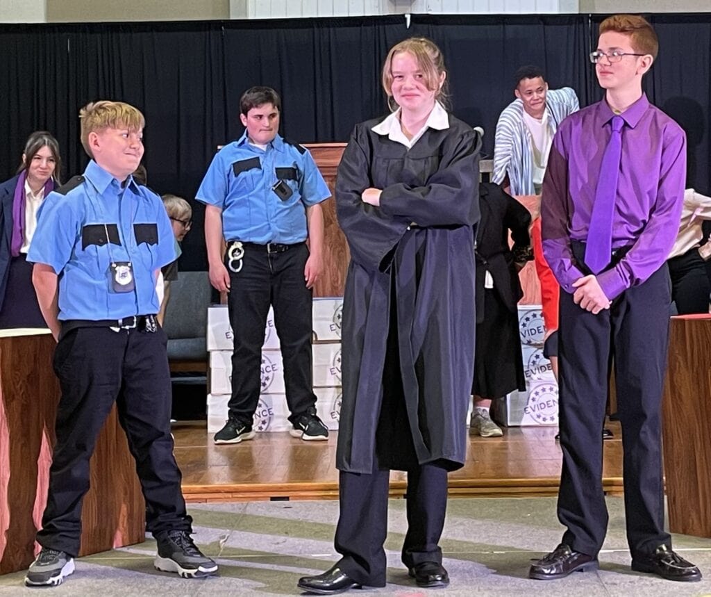 Order in the Court cast members at Martin Luther School