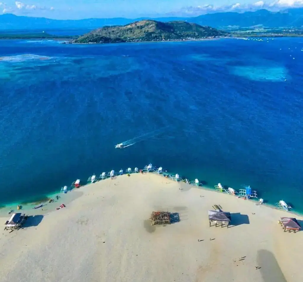 Another aerial shot looking across a portion of the sandbar back toward Negros Island.
