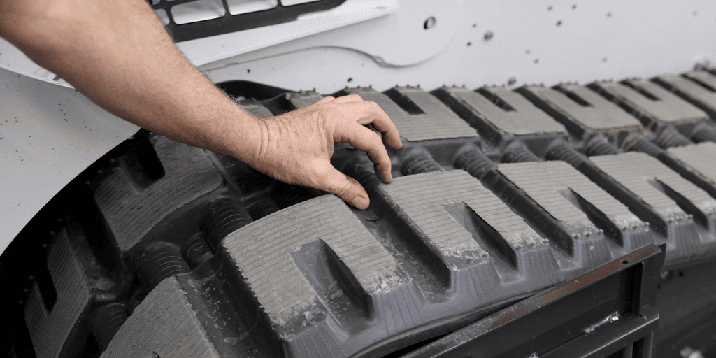 4. Inspect Tracks or Tires for Wear 