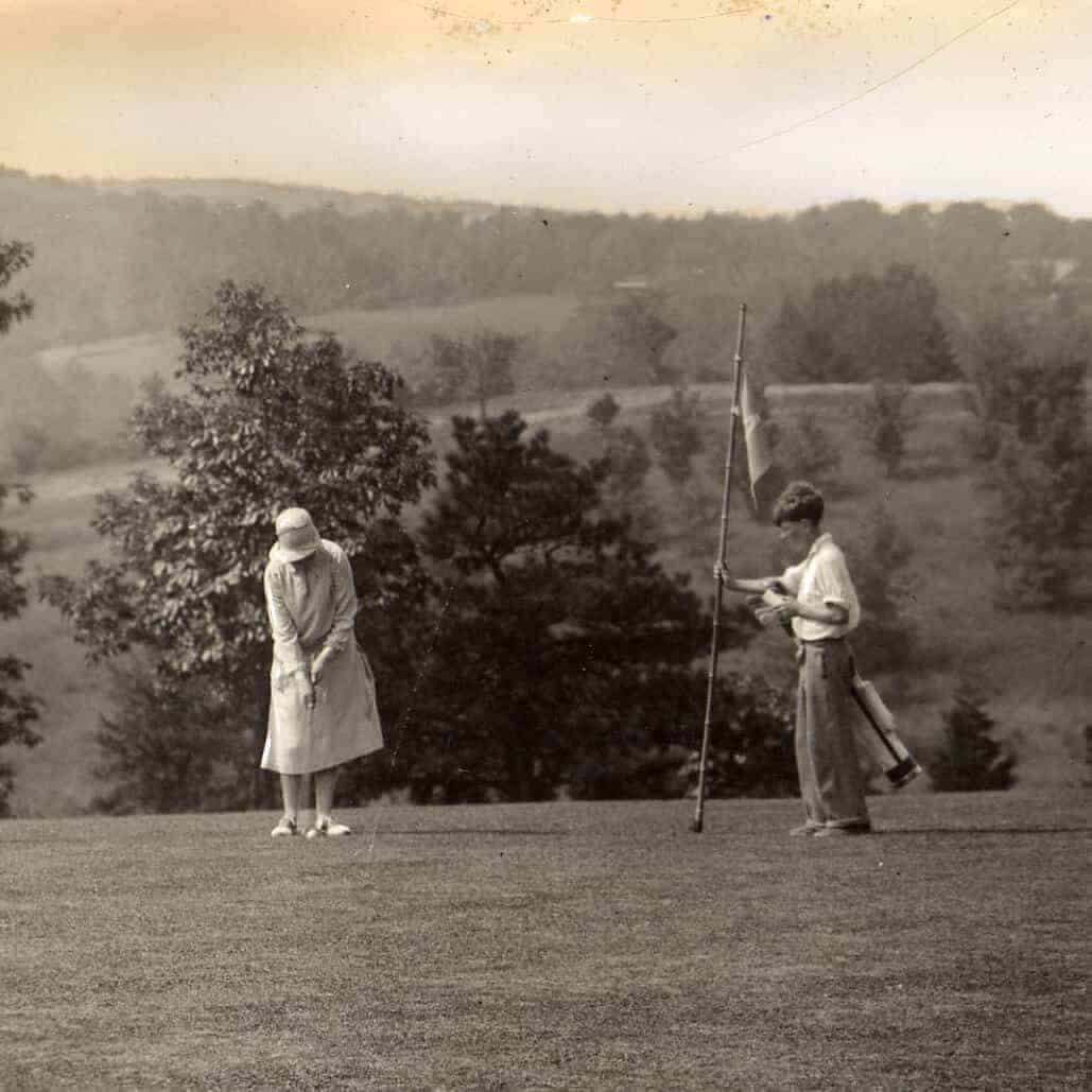 Woman Playing Golf in 1920 at Our 9-Hole Golf Course