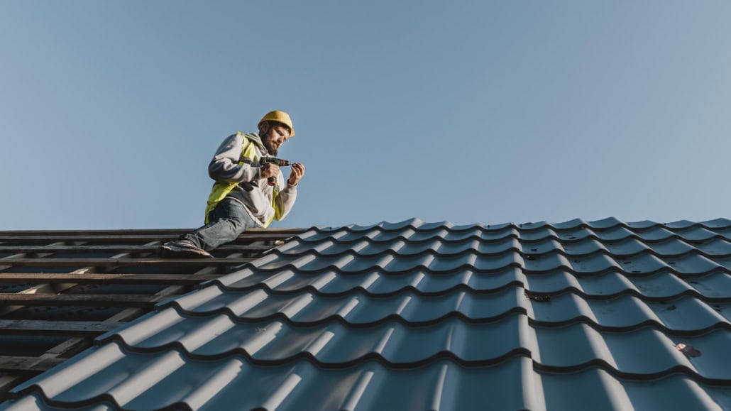 Experiences roofing contractors working on the repair of a residential roof. Get your free estimate today.
