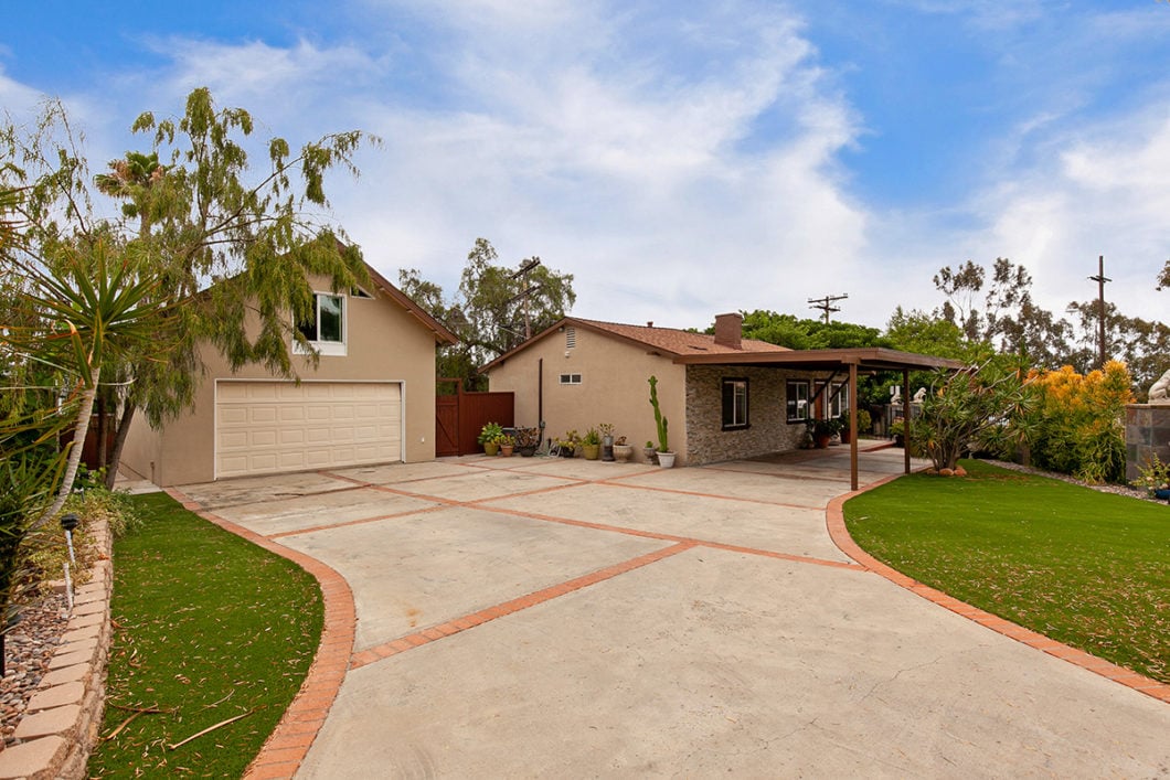 large front driveway with views garage and house