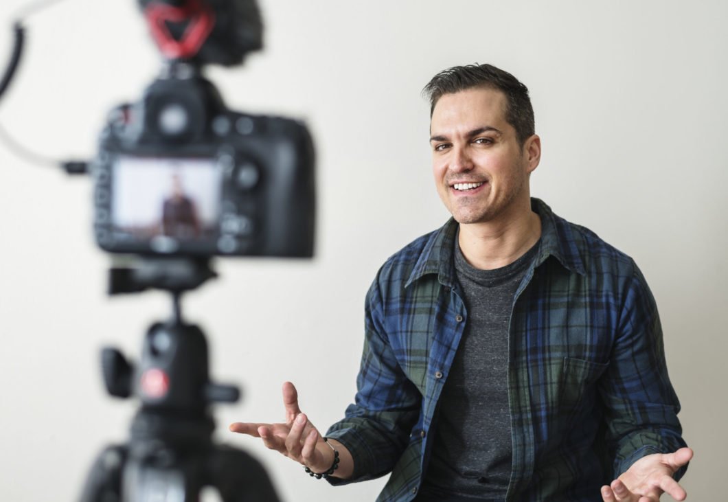 blogger, recording video, camera