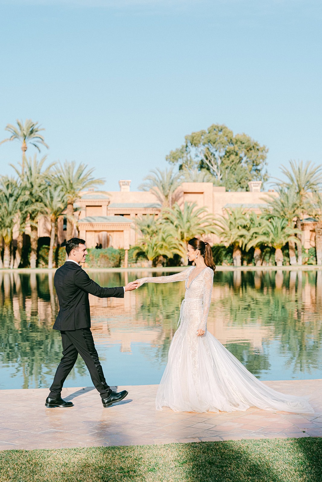 Andrea Gallucci - Destination Wedding Photographer- Amalfi Coast Positano Santorini Barcellona Rome Ravello Paris New York Natural laughter during a wedding portrait session in Marrakech