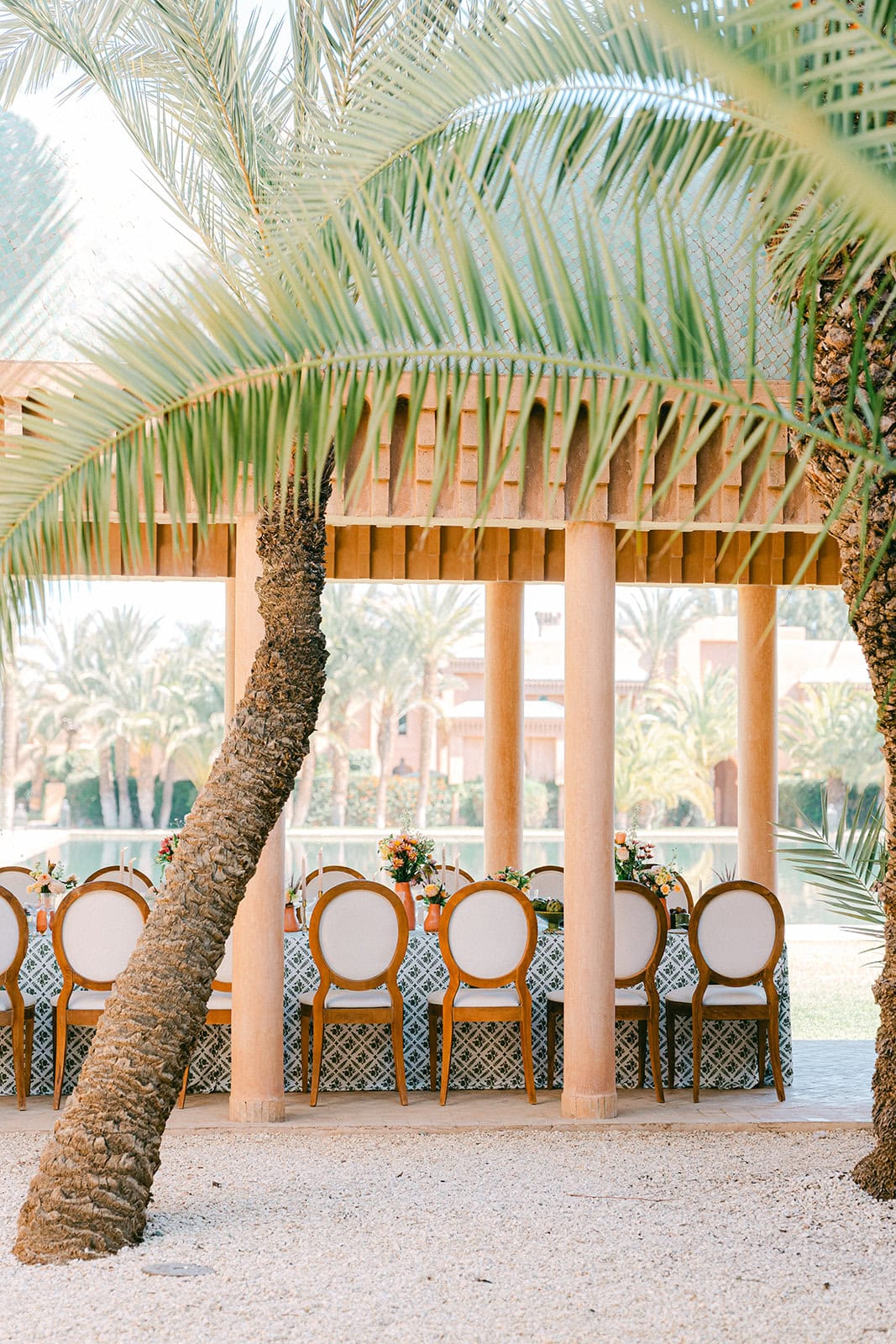 Andrea Gallucci - Destination Wedding Photographer- Amalfi Coast Positano Santorini Barcellona Rome Ravello Paris New York Reception table styling at a Morocco wedding with terracotta tones, and local florals
