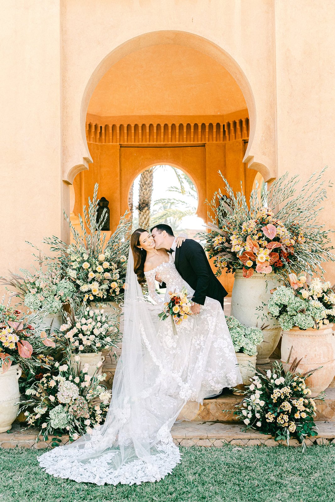 Andrea Gallucci - Destination Wedding Photographer- Amalfi Coast Positano Santorini Barcellona Rome Ravello Paris New York Styled wedding ceremony in Morocco with vibrant flowers and luxury resort backdrop