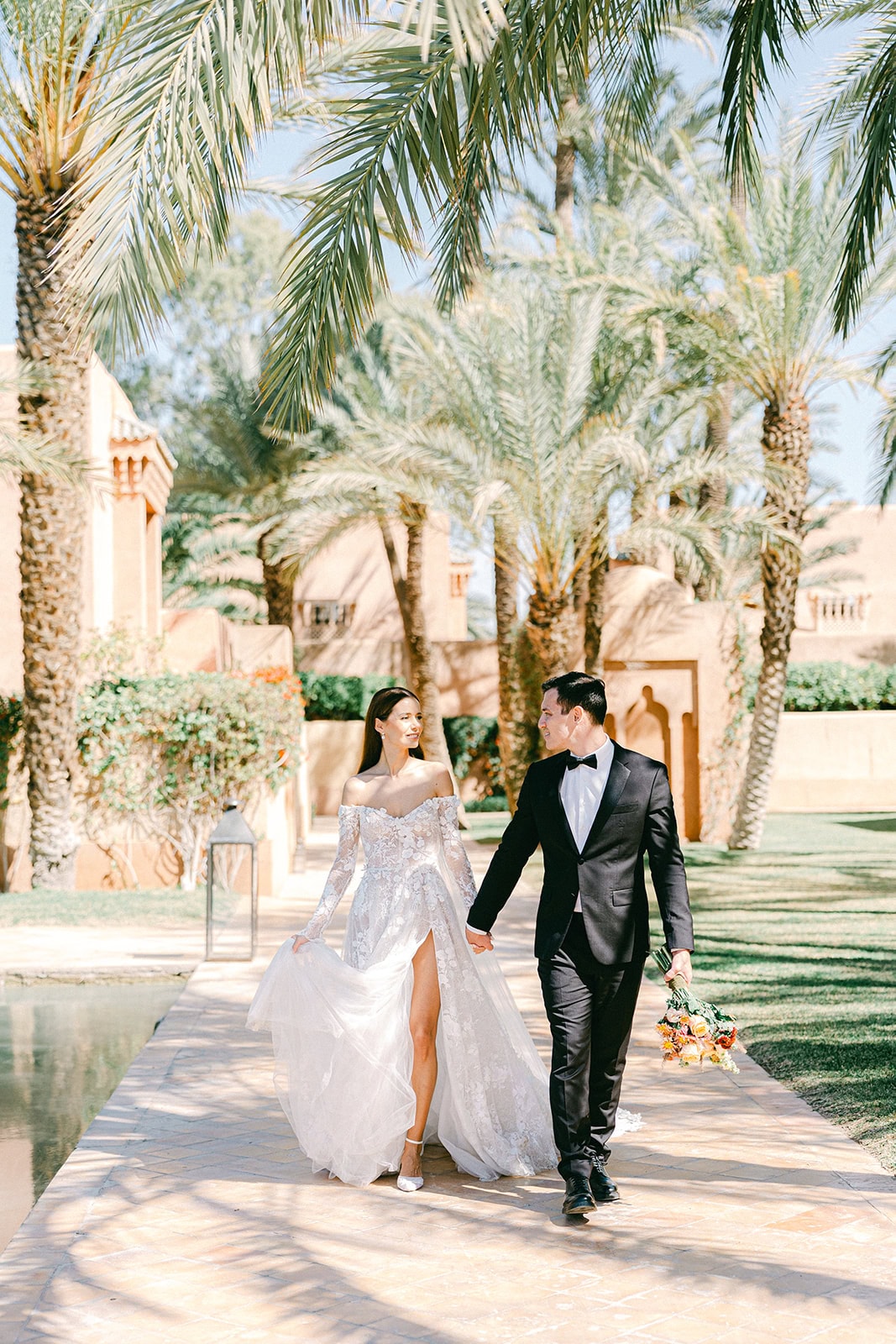 Andrea Gallucci - Destination Wedding Photographer- Amalfi Coast Positano Santorini Barcellona Rome Ravello Paris New York Candid moment between bride and groom at their Morocco wedding