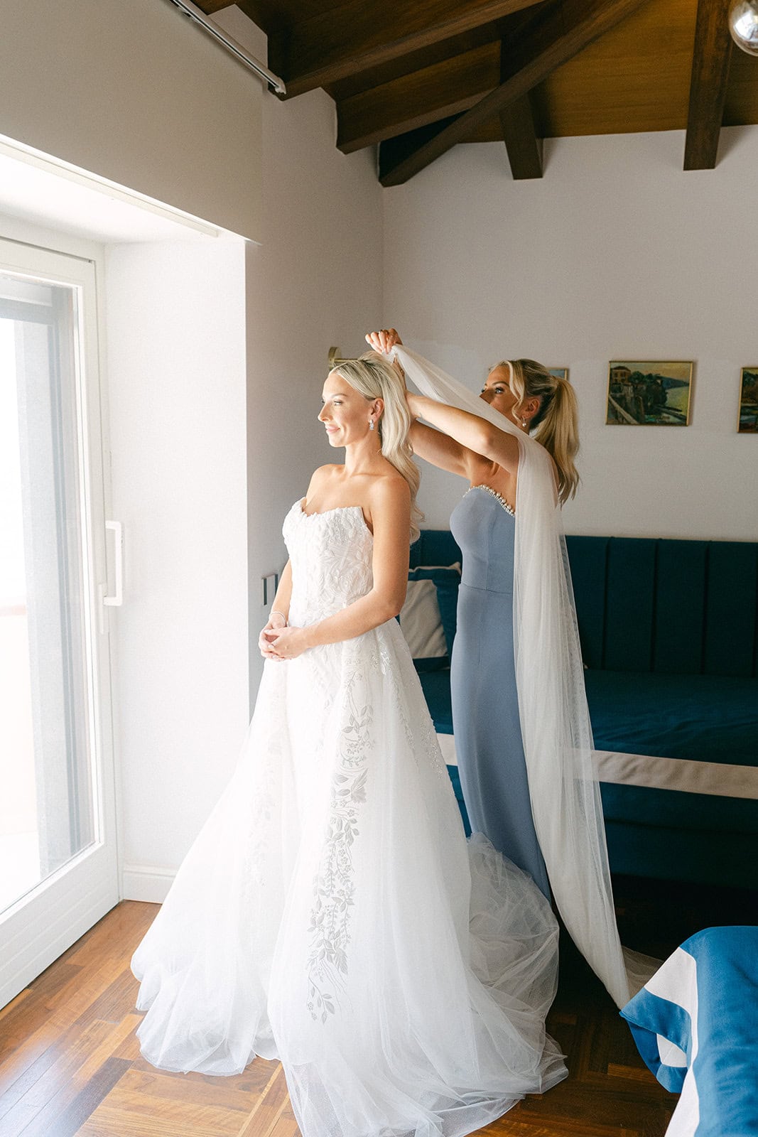 Bridal prep photos candid moment with bride and bridesmaids