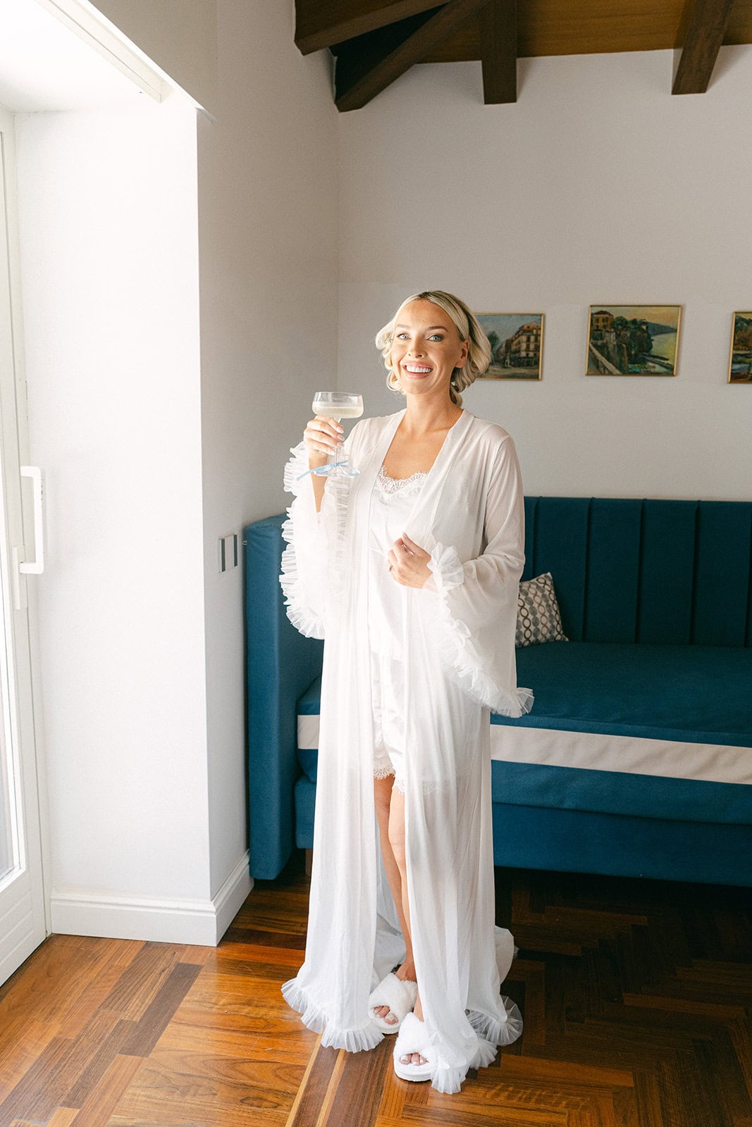 Getting ready pictures wedding bride with champagne toast and laughter