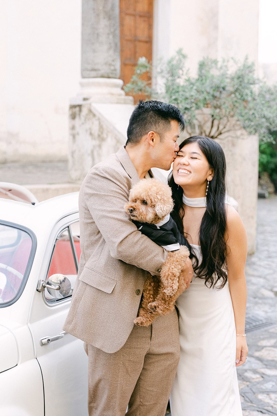 Andrea Gallucci - Destination Wedding Photographer- Amalfi Coast Positano Santorini Barcellona Rome Ravello Paris New York Candid engagement photos with dog in Ravello streets