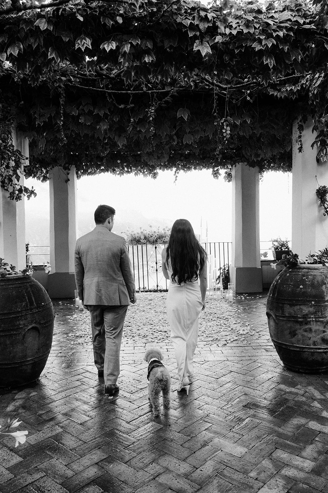 Andrea Gallucci - Destination Wedding Photographer- Amalfi Coast Positano Santorini Barcellona Rome Ravello Paris New York Walking into surprise proposal in the amalfi coast with their puppy