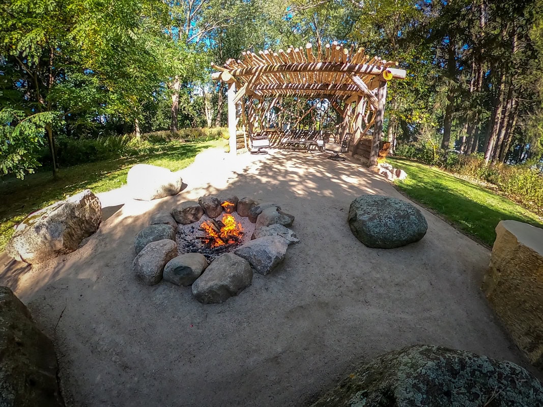 log Pergola with fireplace