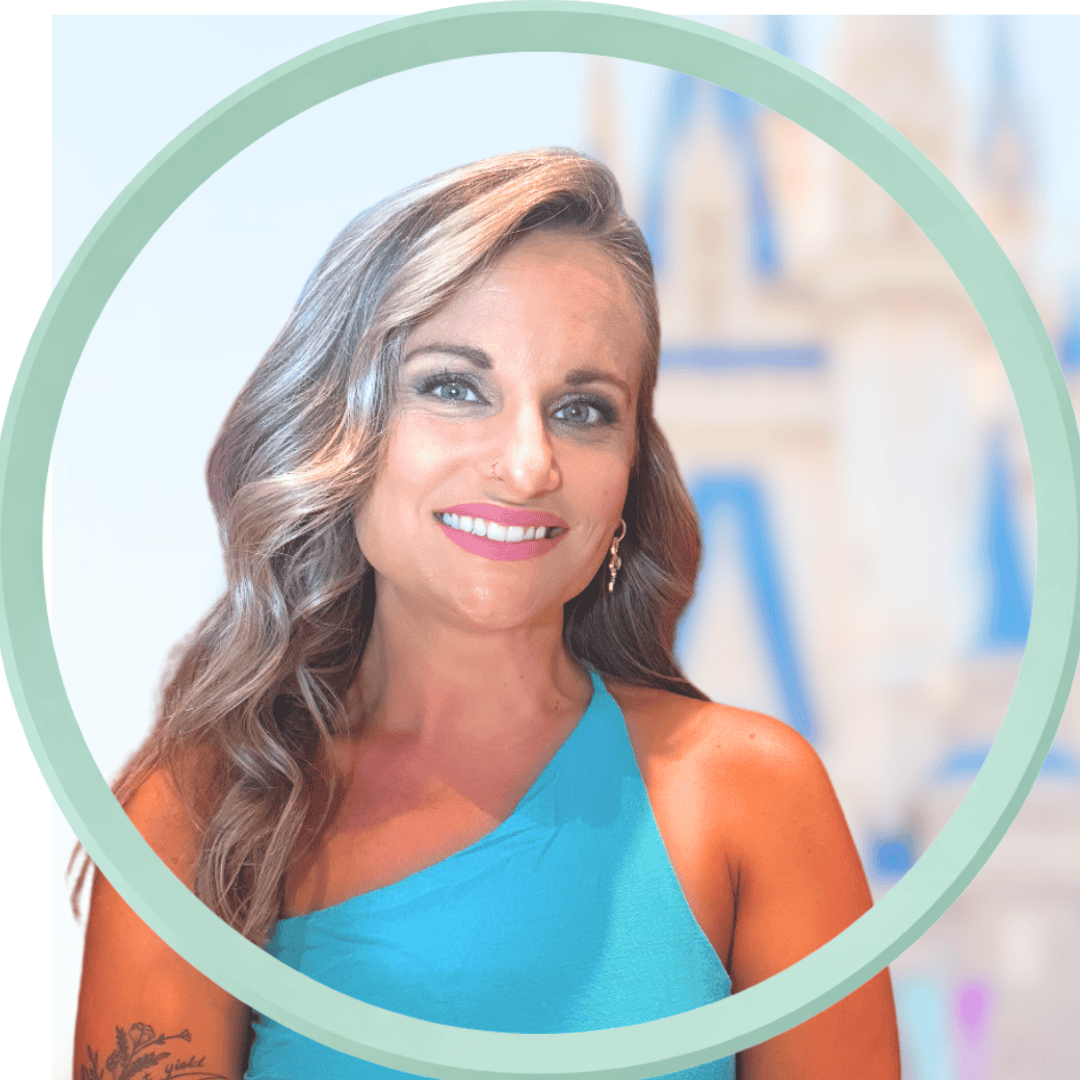 Woman smiling in blue dress with tattoo, professional portrait for vacation planning.