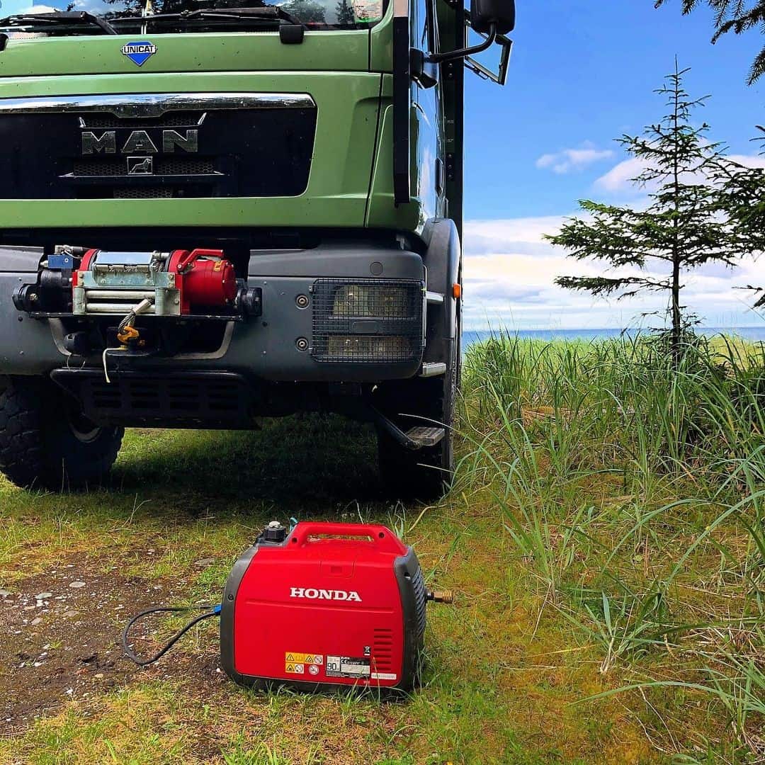 red generator and truck