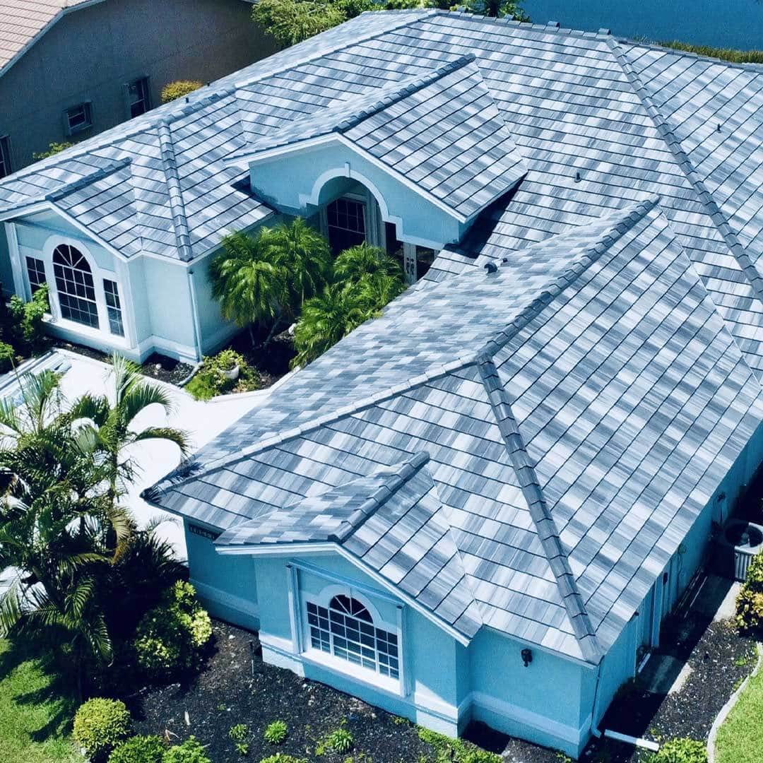 Expert Roof Installation Services by Superior Built Roofing Professional roofers installing a new asphalt shingle roof on a residential home in Fort Myers