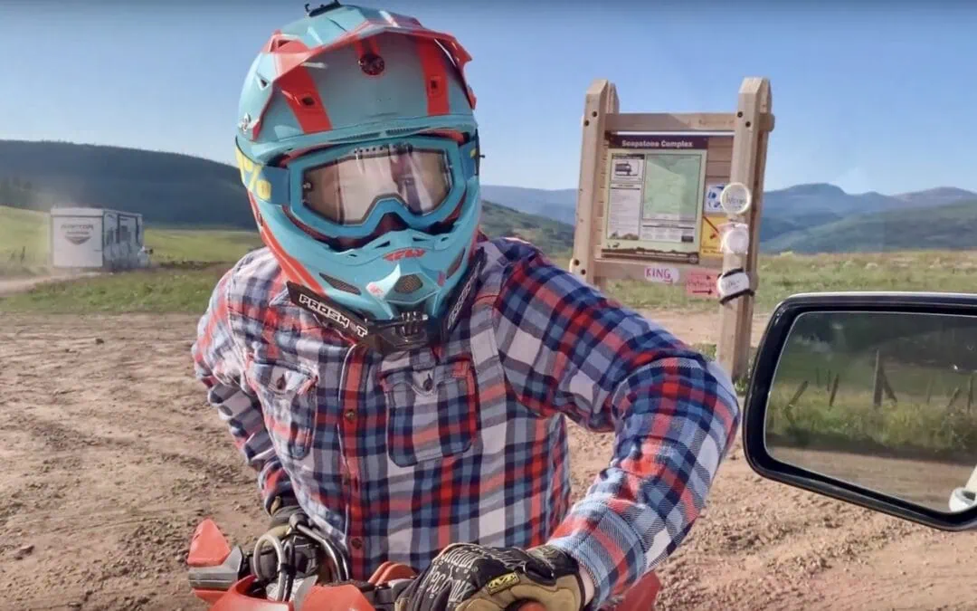 Sam and his blue dirt bike helmet