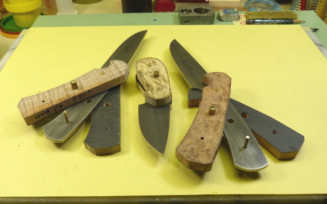 Handles being fitted to knife blanks