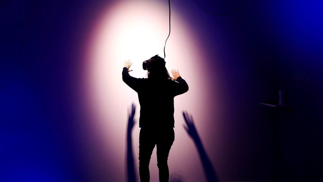A person wearing a virtual reality headset.