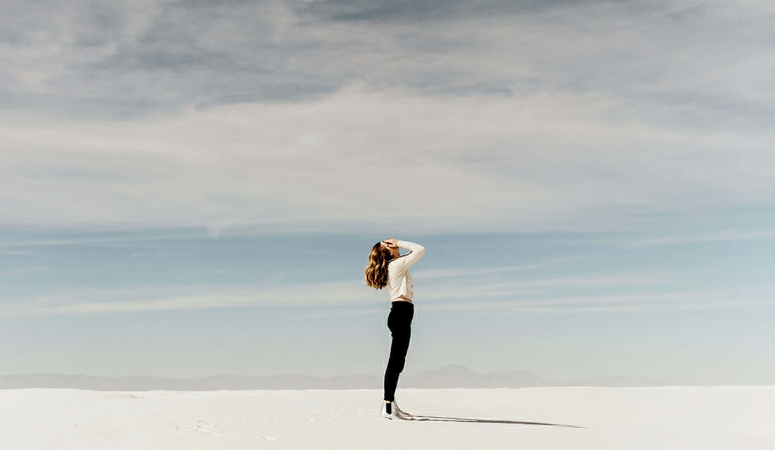 woman against a wide background