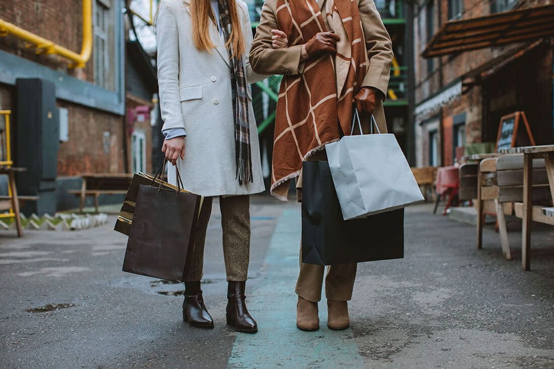 two ladies shopping for petite brands