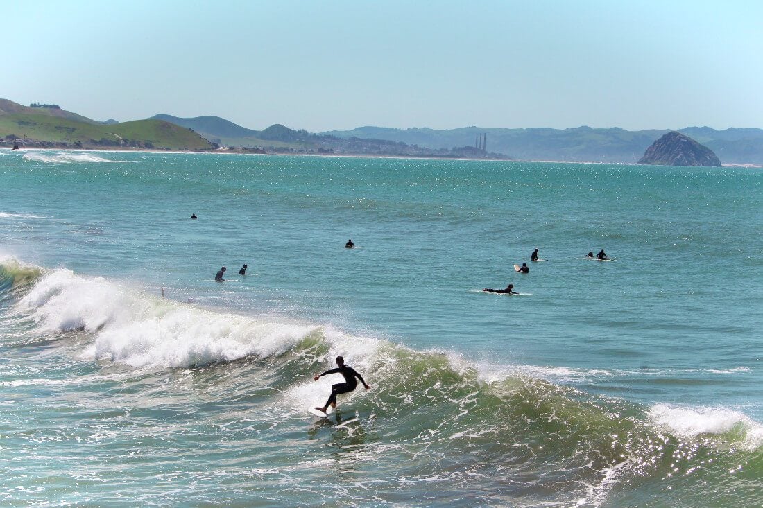 Surfers in Cayucos, California on the central coast