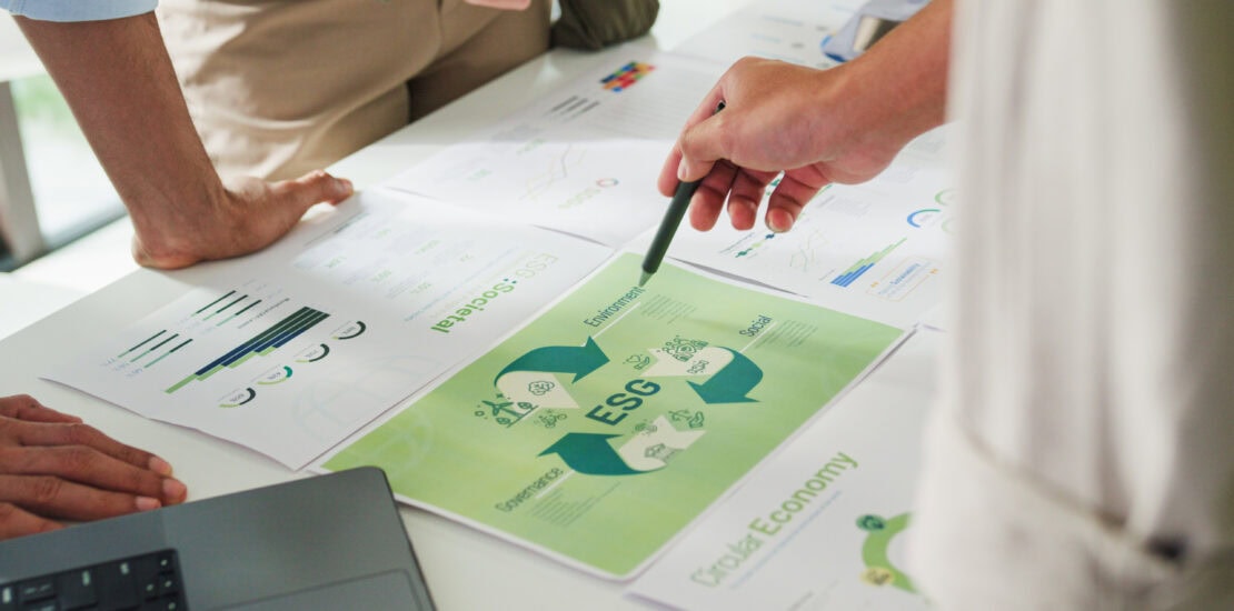 Closeup group businesspeople talk ESG strategies risk management workshop, SDGs report, global warming, green finance investment eco friendly and net zero waste in boardroom training building.