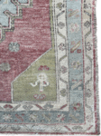 Tate Turkish rug with geometric and floral patterns