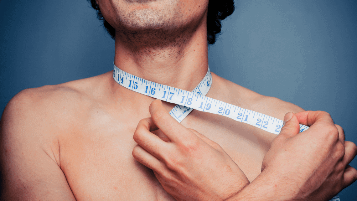 a man having his neck measured