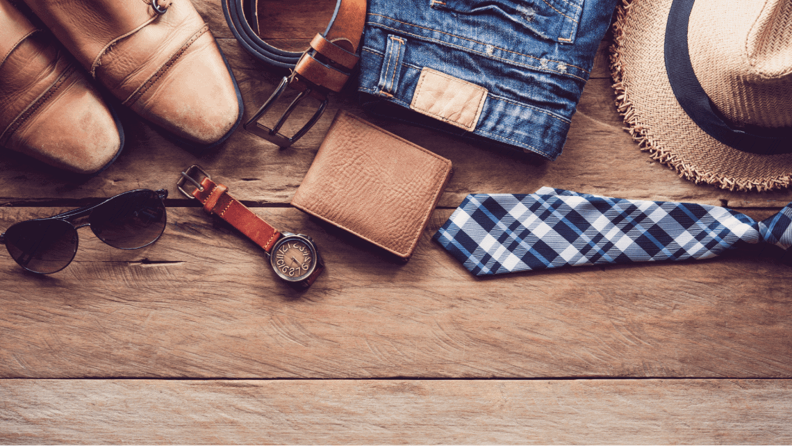 mens accessories on a wooden background